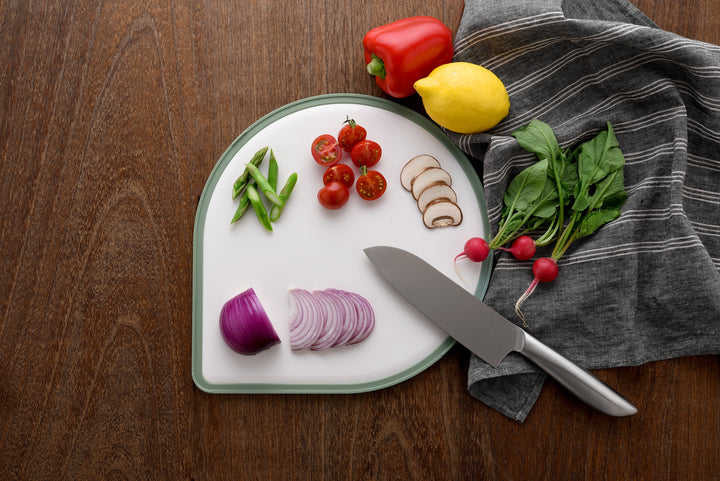 Teardrop-shaped cutting board